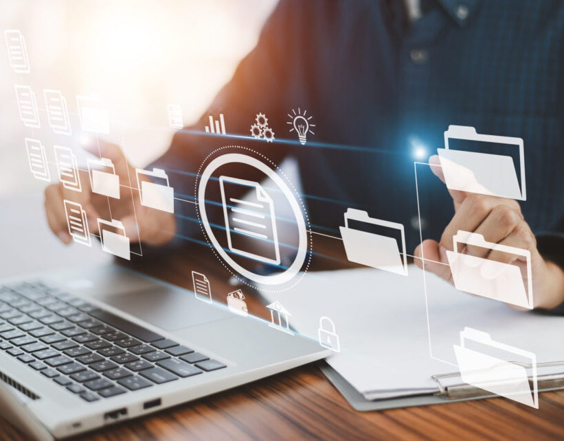 Document management concept, Businessman using  computer to document management concept, online documentation database and digital file storage system or software, records keeping, database technology