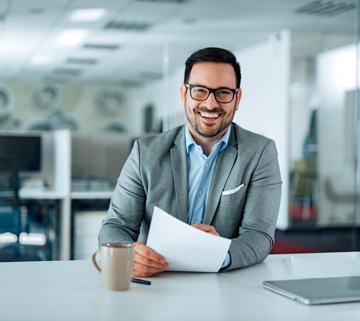 Portrait of a successful company leader in the office. Portrait of a successful company leader in the office.