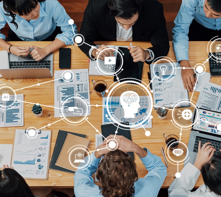 A dynamic team engages in data analysis and business strategy planning, utilizing advanced technology and collaborative tools to foster innovation in the workspace. Amity